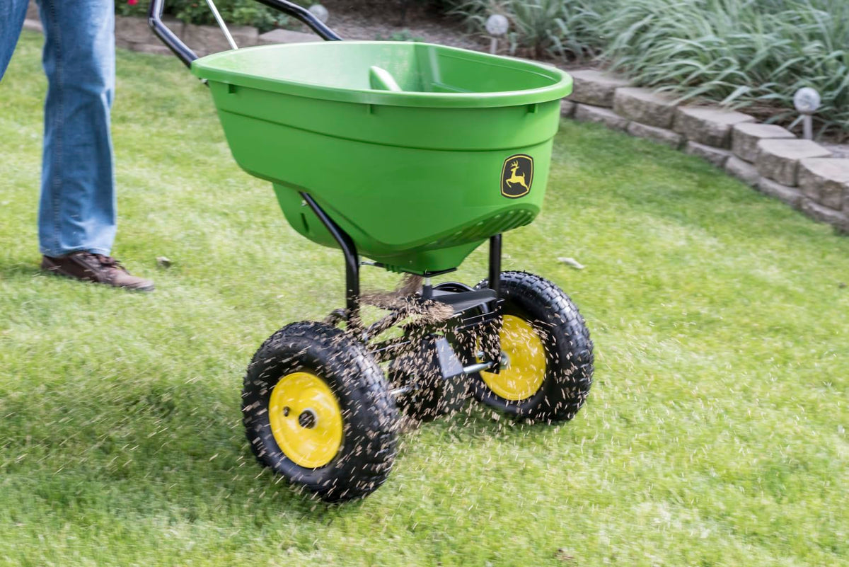 John Deere Push Broadcast Spreader for Fertilizer, Grass Seed and Ice Melt, 130 lb Capacity Lawn & Garden Spreader with 12 Ft Spread Width
